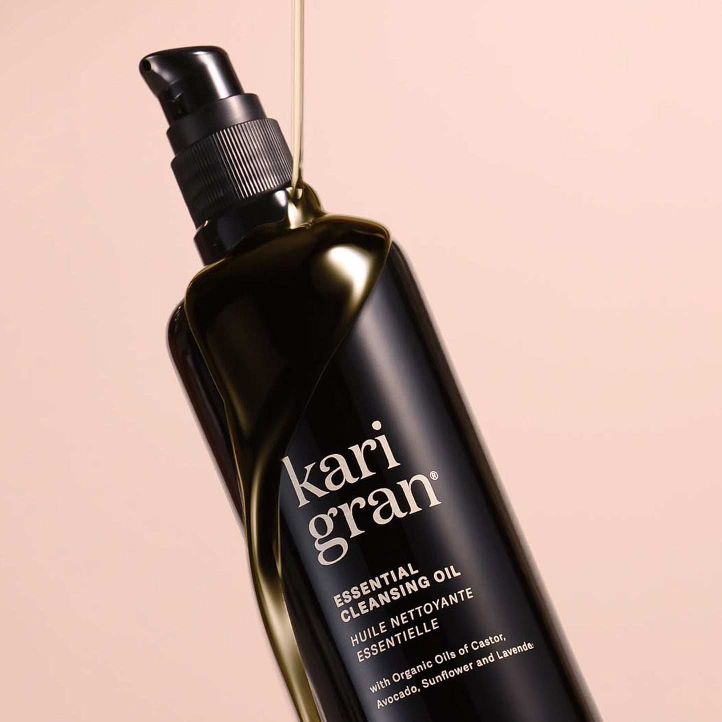essential cleansing oil on pink