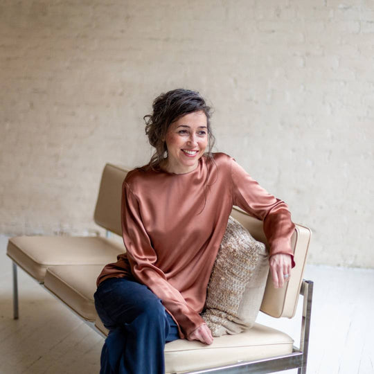 tammera sitting on a couch 