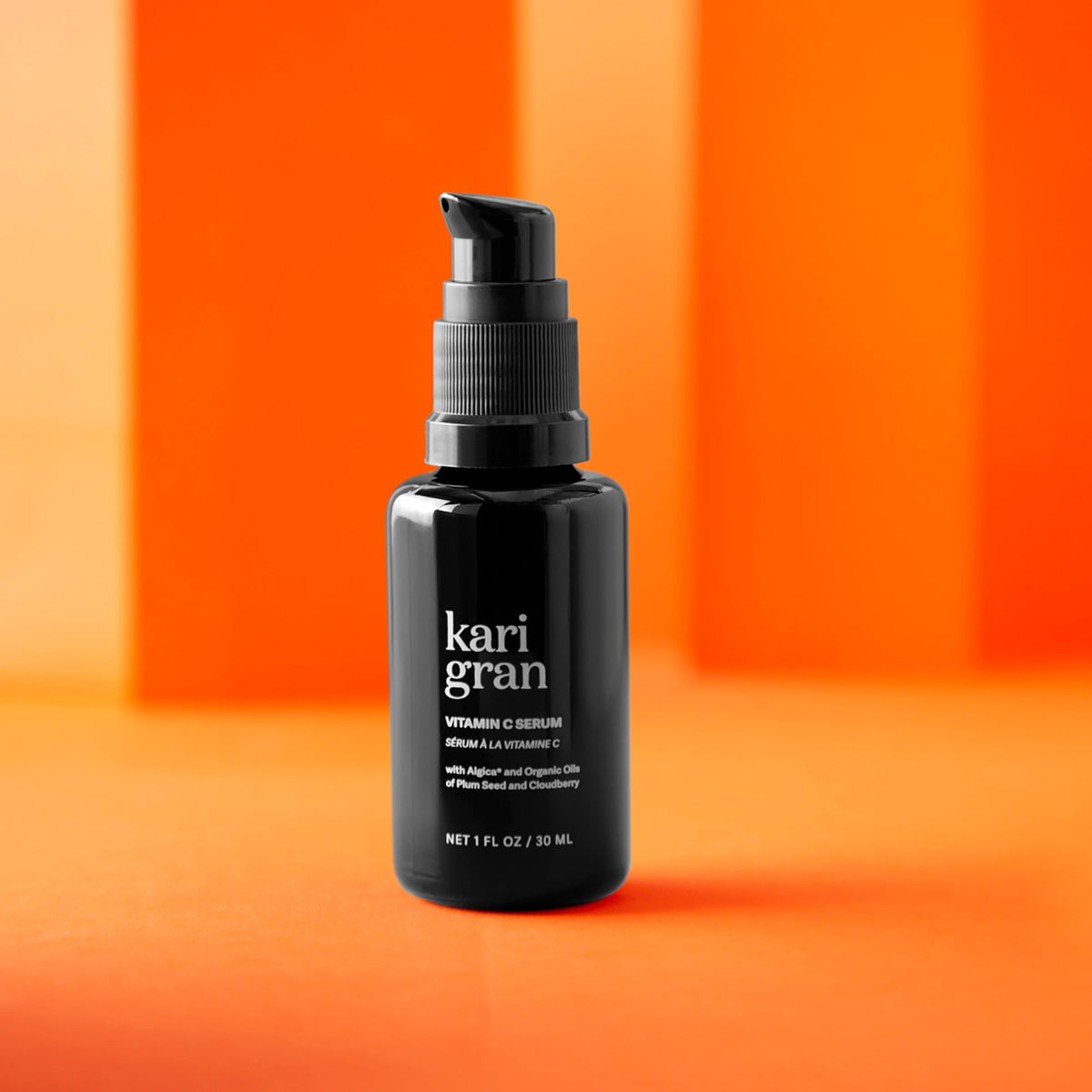 Kari Gran Vitamin C serum on an orange background