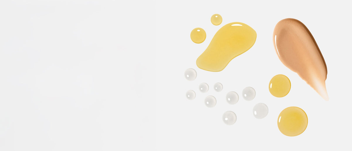 kari gran cleansing oil, hydrating tonic, and serum next to ingredients