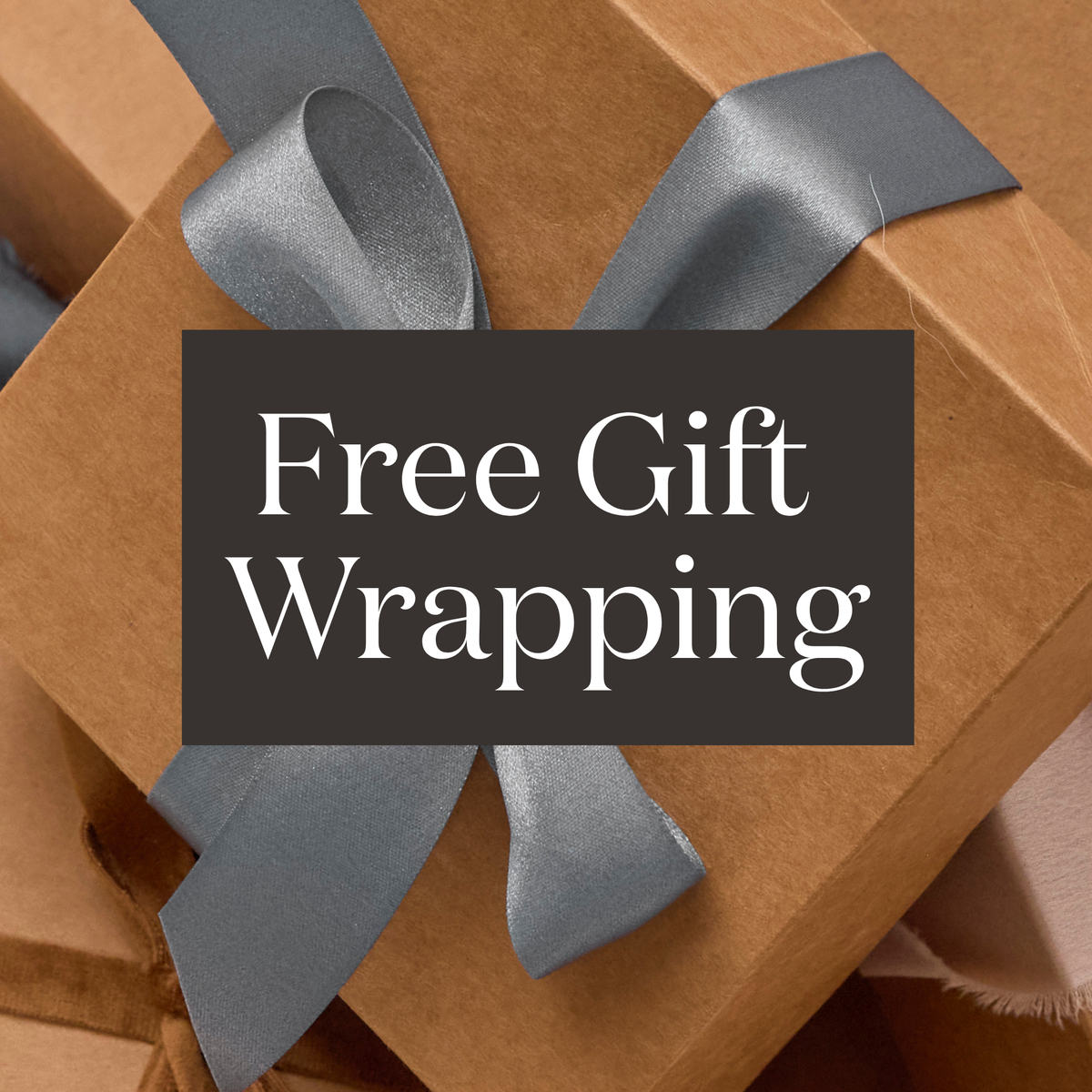Brown gift box with gray ribbon and 'Free Gift Wrapping' text overlay