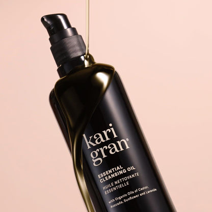 essential cleansing oil on pink