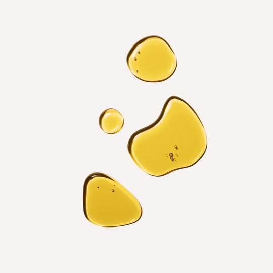 drops of cleansing oil, peptide serum, and vitamin c serum