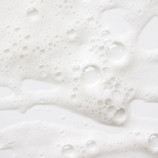 close up of luxe cleansing bar suds